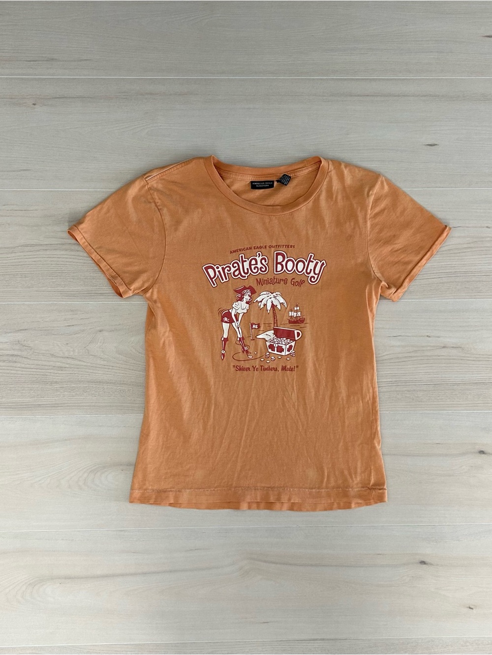 y2k american eagle pirates booty baby tee
